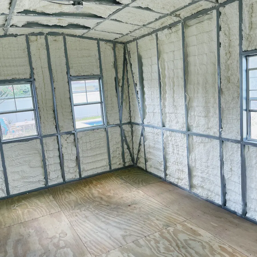 Closed-cell spray foam insulation applied to wall cavities in a residential project in Lakewood